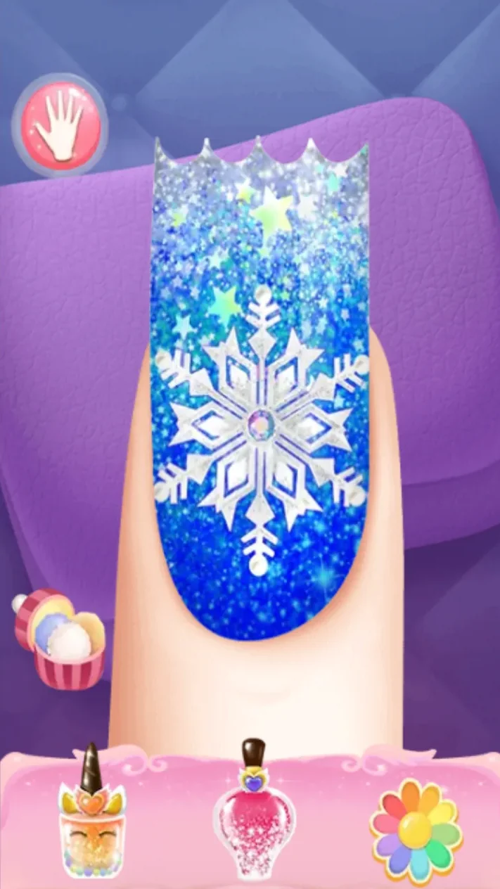 Blue glitter nail with stars and a large white snowflake